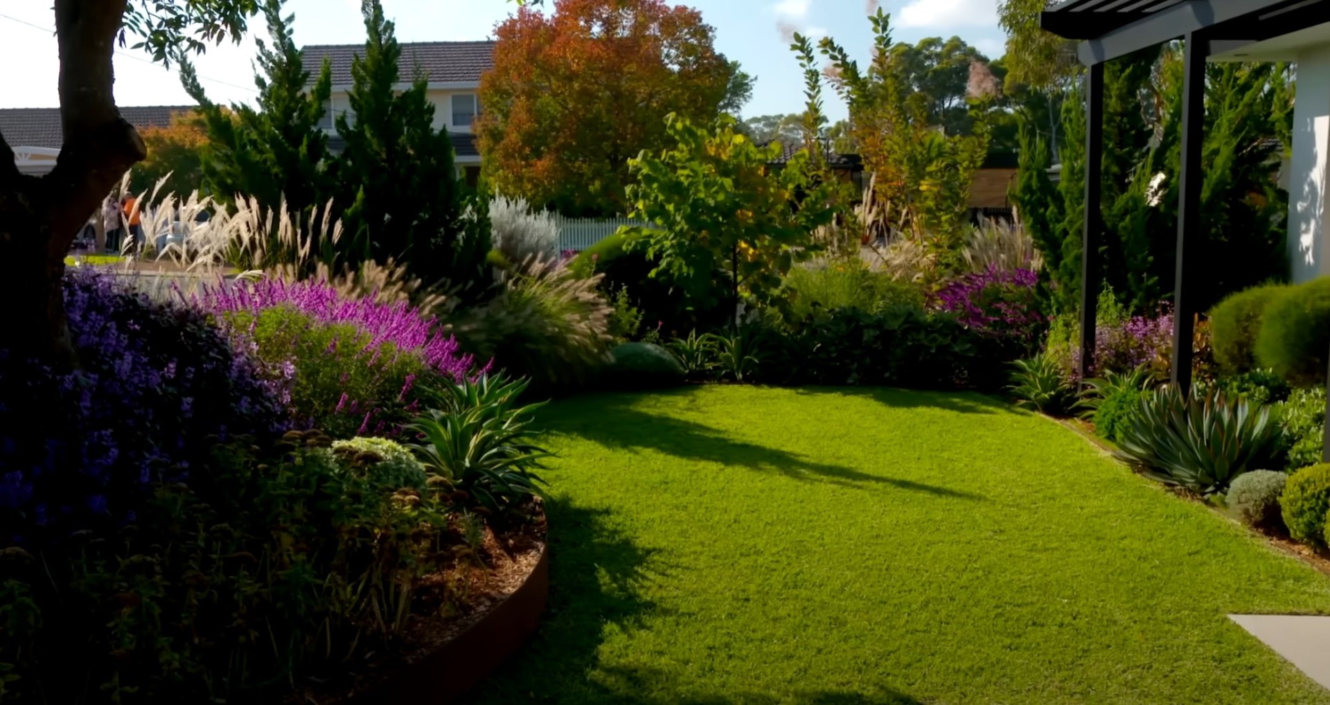 Beautiful residential landscape with lush plantings and modern design